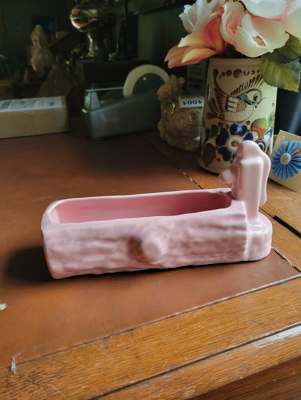 Vintage pink log trough with water pump flower pot